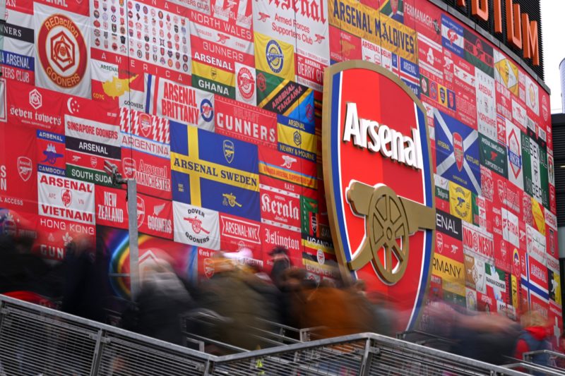 LONDON, ENGLAND - FEBRUARY 11: A detailed view of the We All Follow The Arsenal stadium wrap around prior to the Premier League match between Arsen...