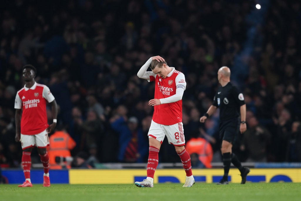 LONDON, ENGLAND - FEBRUARY 15: Martin Odegaard of Arsenal looks dejected during the Premier League match between Arsenal FC and Manchester City at Emirates Stadium on February 15, 2023 in London, England. (Photo by Shaun Botterill/Getty Images)