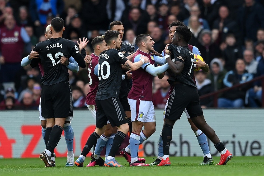 BIRMINGHAM, ENGLAND: Bukayo Saka and Jorginho of Arsenal clash with Emi Buendia of Aston Villa during the Premier League match between Aston Villa ...