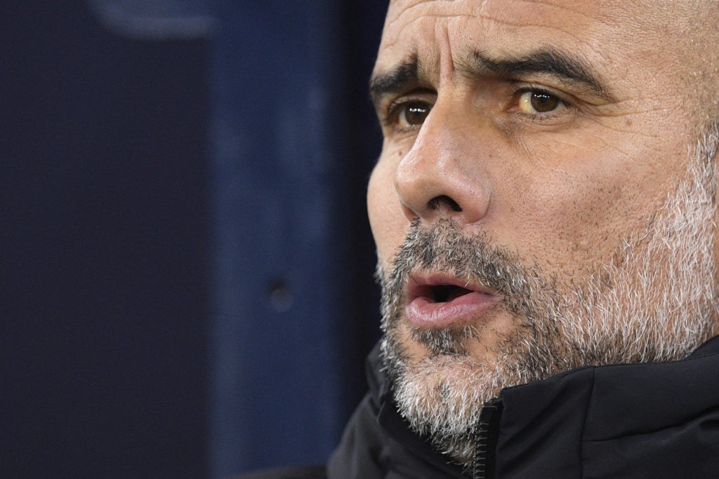Manchester City's Spanish manager Pep Guardiola attends the English FA Cup fourth round football match between Manchester City and Arsenal at the Etihad Stadium in Manchester, northwest England, on January 27, 2023. (Photo by OLI SCARFF/AFP via Getty Images)