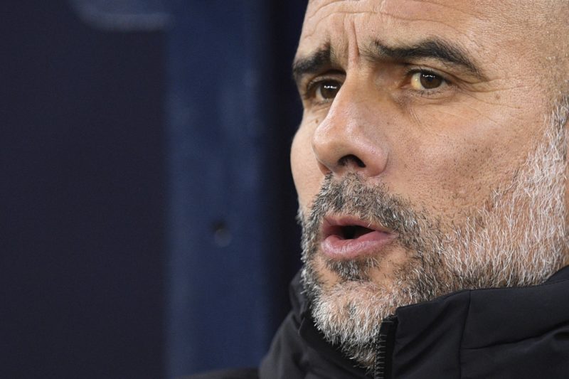 Manchester City's Spanish manager Pep Guardiola attends the English FA Cup fourth round football match between Manchester City and Arsenal at the E...