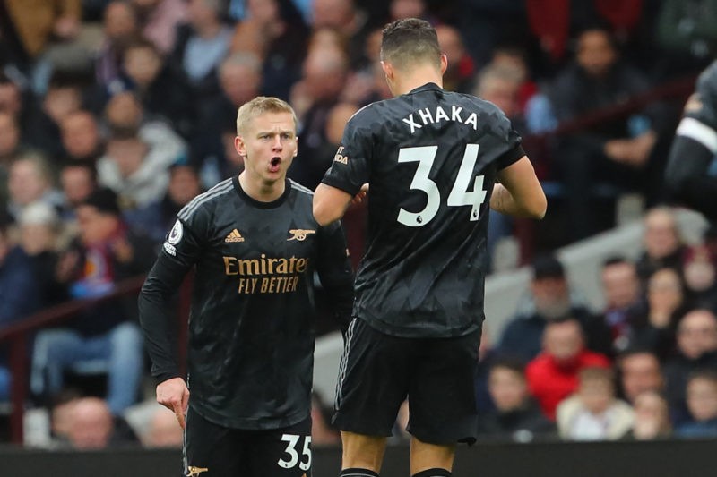 Arsenal's Ukrainian defender Oleksandr Zinchenko (L) celebrates with Arsenal's Swiss midfielder Granit Xhaka (R) after scoring their second goal du...