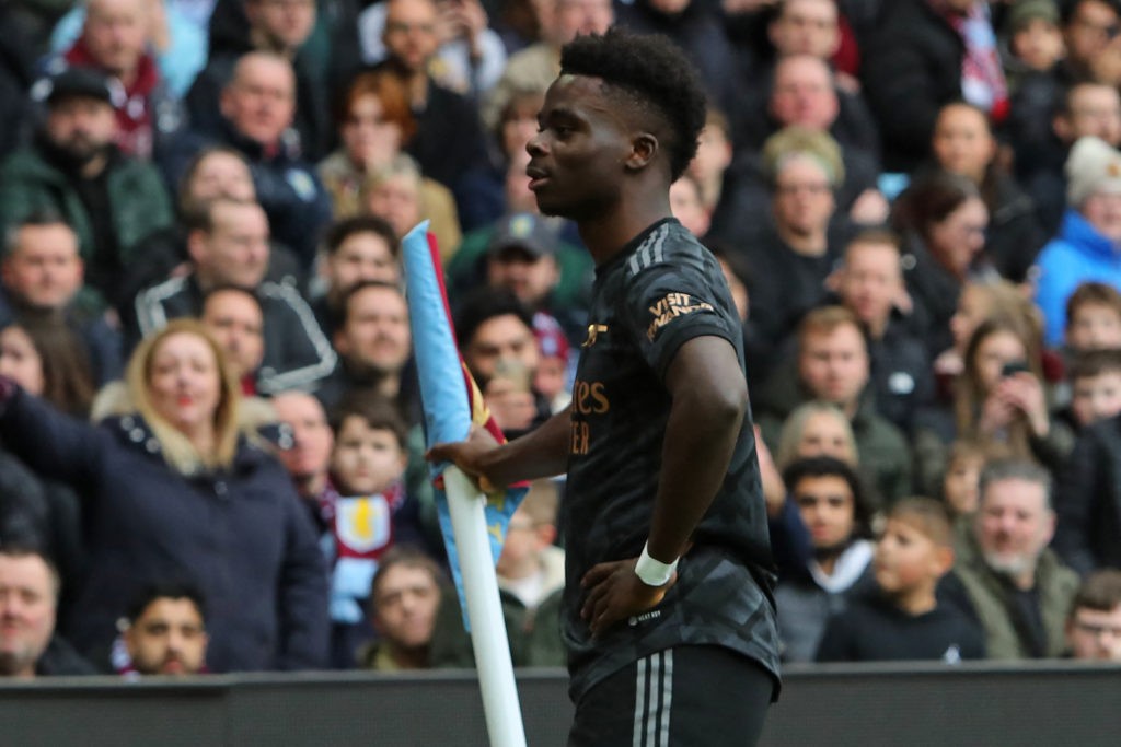Pundit argues Saka is world's best right-winger 4 Arsenal's English midfielder Bukayo Saka celebrates after scoring their first goal during the English Premier League football match between Aston Villa and Arsenal at Villa Park in Birmingham, central England on February 18, 2023. (Photo by GEOFF CADDICK/AFP via Getty Images)