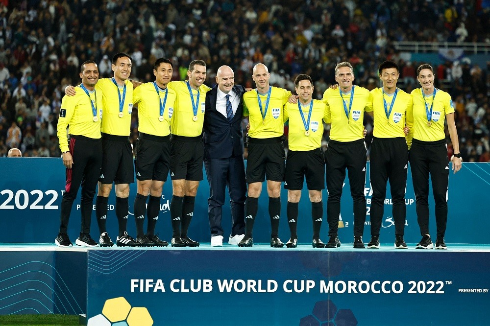 FIFA confirm details for expanded Club World Cup 2 FIFA President Gianni Infantino (C) poses for a picture with the referees at the end of the FIFA Club World Cup final football match between Spain's Real Madrid and Saudi Arabia's Al-Hilal at the Prince Moulay Abdellah Stadium in Rabat on February 11, 2023. (Photo by KHALED DESOUKI/AFP via Getty Images)