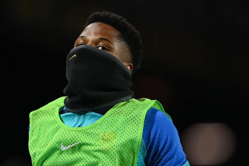 BARCELONA, SPAIN - JANUARY 25: Ansu Fati of FC Barcelona looks on as he warms up during the Copa Del Rey Quarter Final match between FC Barcelona a...