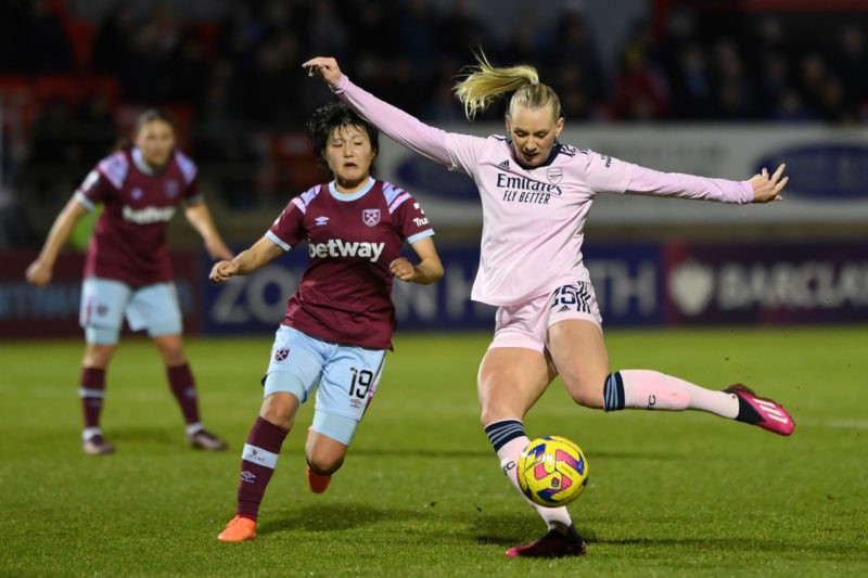 DAGENHAM, ENGLAND - FEBRUARY 05: Stina Blackstenius of Arsenal shoots past Honoka Hayashi of West Ham United during the FA Women's Super League mat...