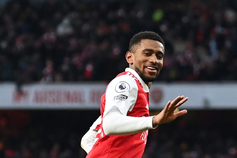 Arsenal's English midfielder Reiss Nelson celebrates after scoring his team third goal of the team during the English Premier League football match...