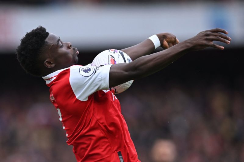 Bukayo Saka, the English midfielder for Arsenal, demonstrates his ball control skills during a Premier League football match against Crystal Palace...