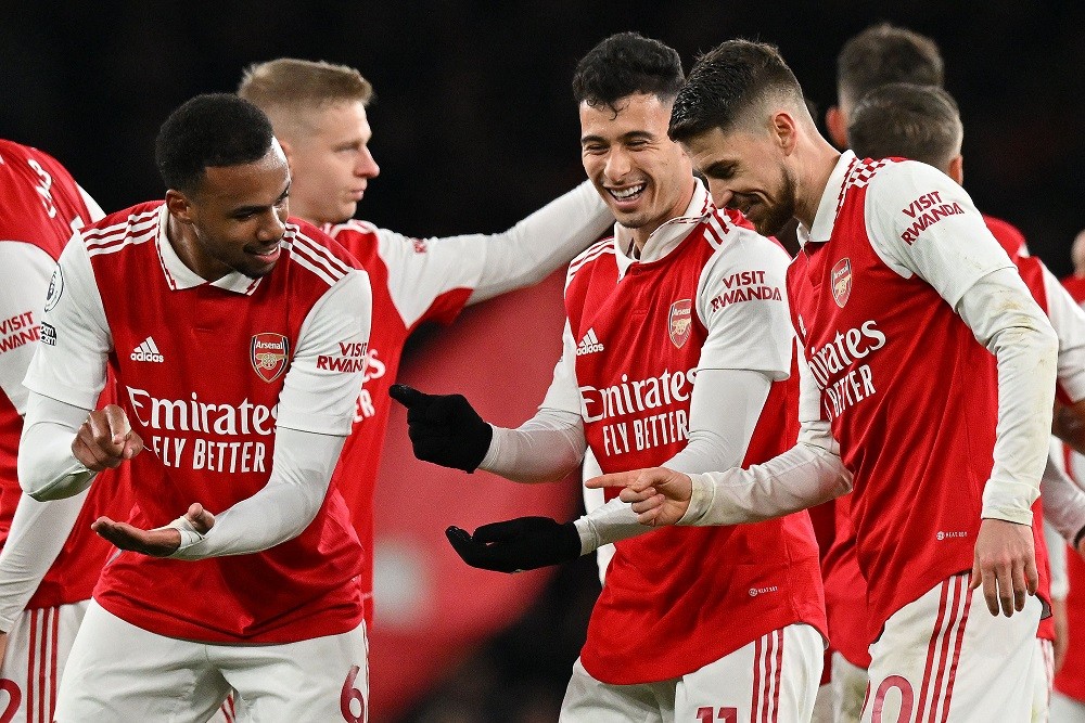 Arsenal have Champion's attitude says Dyche but Neville won't believe it 3 Arsenal's Gabriel Martinelli celebrates scoring the team's second goal with Gabriel Magalhaes (L) and Jorginho during the English Premier League football match between Arsenal and Everton at the Emirates Stadium in London on March 1, 2023. (Photo by GLYN KIRK/AFP via Getty Images)