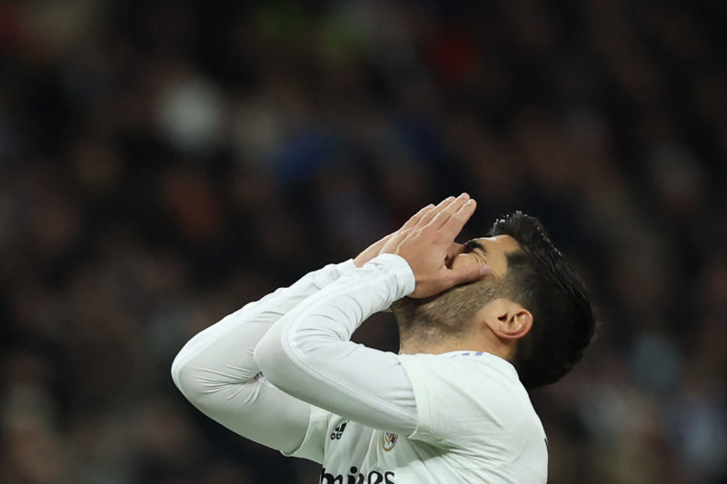 Real Madrid's Spanish midfielder Marco Asensio reacts during the Spanish League football match between Real Madrid CF and Club Atletico de Madrid a...