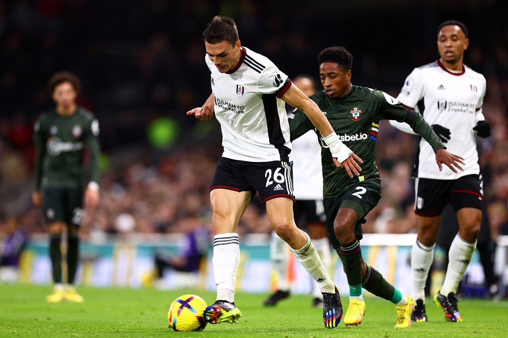 LONDON, ENGLAND: Joao Palhinha of Fulham is challenged by Kyle Walker-Peters of Southampton during the Premier League match between Fulham FC and S...