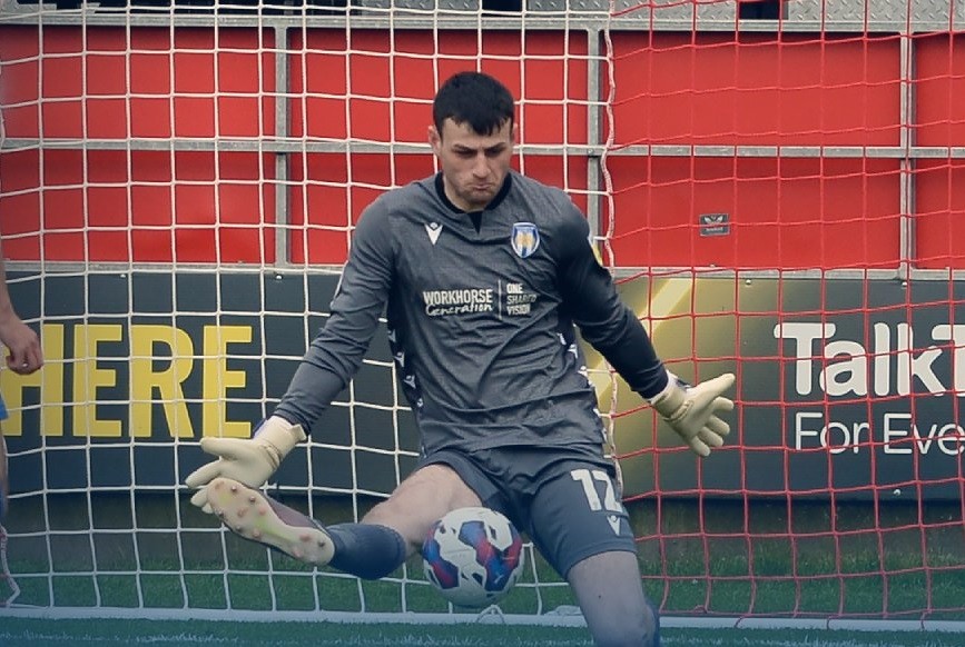 "Brilliant": Arsenal loanee praised as his team avoid relegation 2 Tom Smith makes a save for Colchester United (Photo via Colchester United on Twitter)