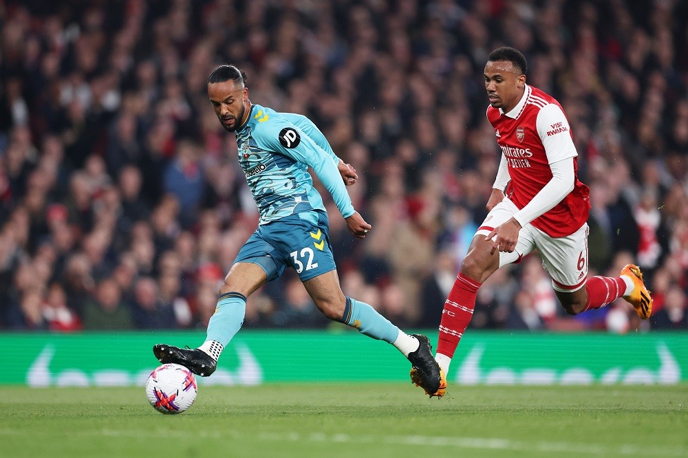 LONDON, ENGLAND: Theo Walcott of Southampton scores the team's second goal past Gabriel of Arsenal during the Premier League match between Arsenal ...