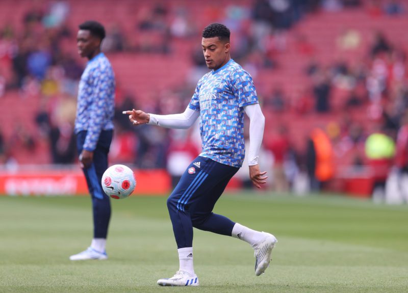 LONDON, ENGLAND - APRIL 23: Miguel Azeez of Arsenal warms up prior to the Premier League match between Arsenal and Manchester United at Emirates St...