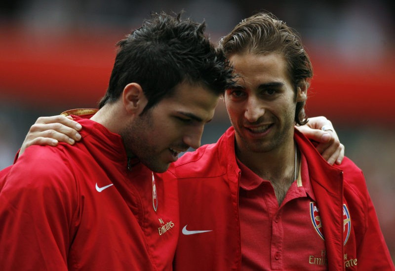 Arsenal's French Midfielder Mathieu Flamini (R) Spanish Midfielder Cesc Fabregas after their Premier League match against Everton at the Emirates S...