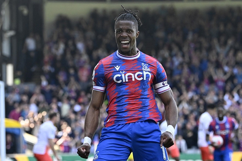 Crystal Palace's Ivorian striker Wilfried Zaha celebrates after scoring their second goal during the English Premier League football match between ...