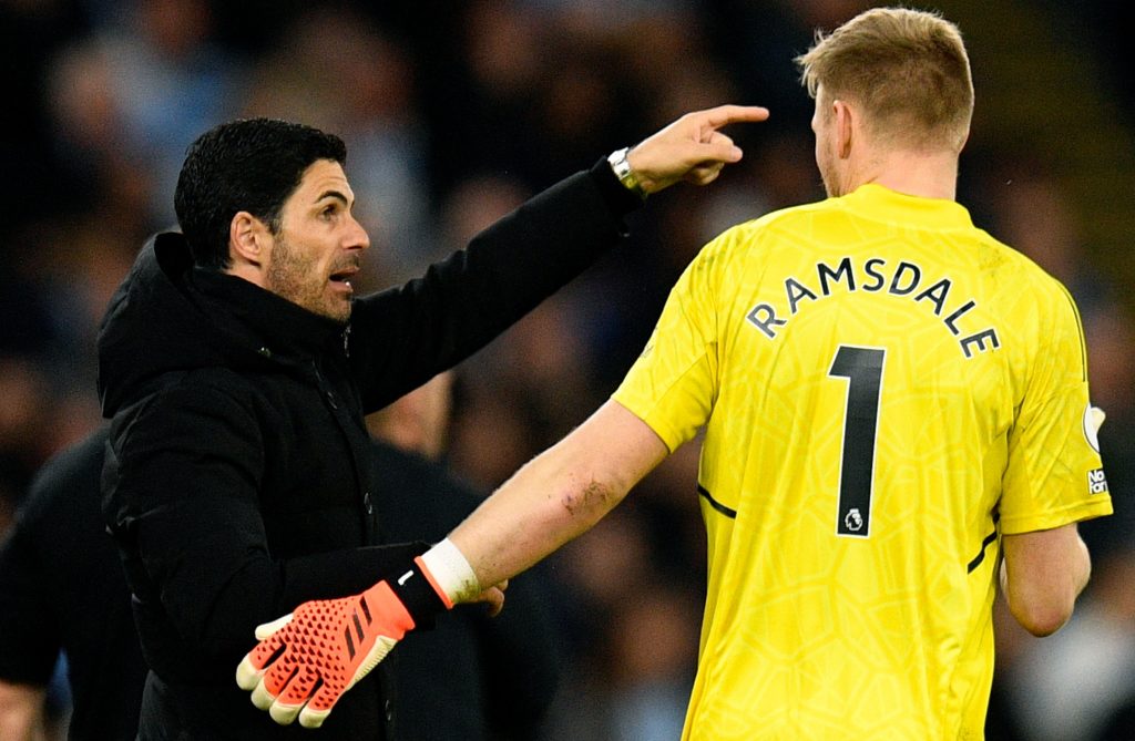 Arsenal to benefit from work permit rule change 3 Arsenal's Spanish manager Mikel Arteta (L) shouts instructions to the players from the touchline to Arsenal's English goalkeeper Aaron Ramsdale during the English Premier League football match between Manchester City and Arsenal at the Etihad Stadium in Manchester, north west England, on April 26, 2023. (Photo by OLI SCARFF/AFP via Getty Images)
