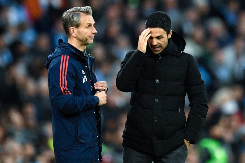 Arsenal's Spanish manager Mikel Arteta (R) reacts during the English Premier League football match between Manchester City and Arsenal at the Etiha...