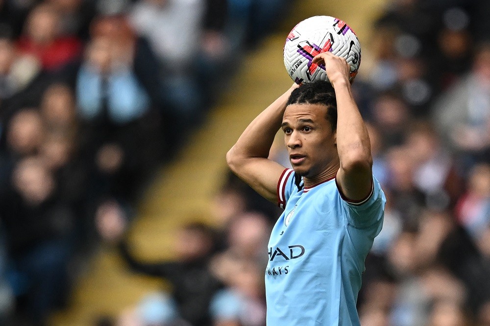 Manchester City's Dutch defender Nathan Ake looks to take a throw-in during the English Premier League football match between Manchester City and Liverpool at the Etihad Stadium in Manchester, north-west England, on April 1, 2023. (Photo by PAUL ELLIS/AFP via Getty Images)