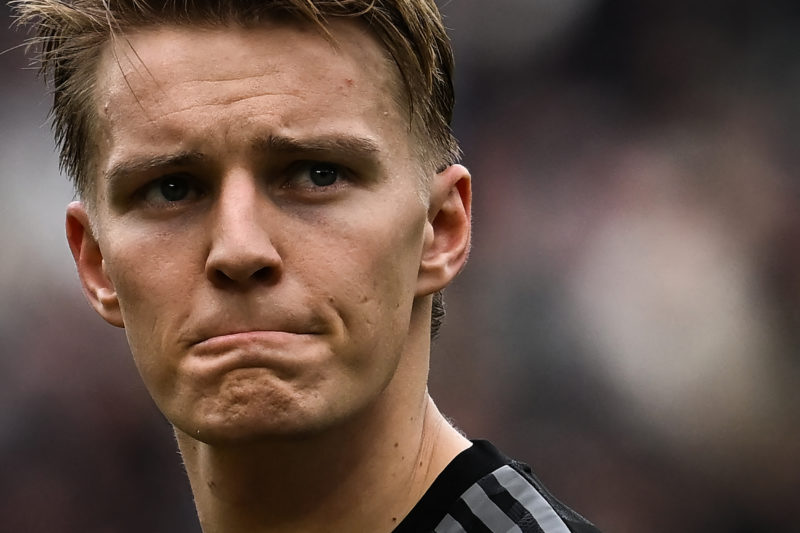 Arsenal's Norwegian midfielder Martin Odegaard reacts at the end of the English Premier League football match between West Ham United and Arsenal a...