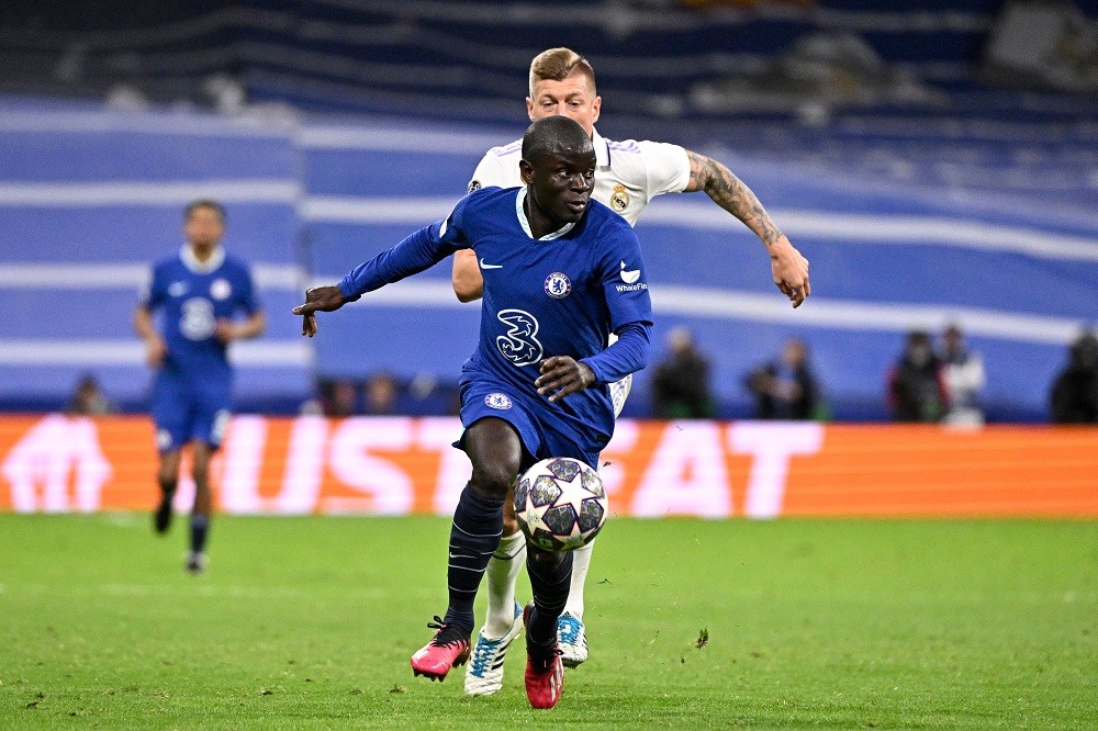 Chelsea's French midfielder N'Golo Kante vies with Real Madrid's German midfielder Toni Kroos (back) during the UEFA Champions League quarter-final...