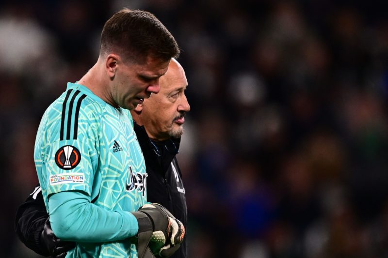 Juventus' Polish goalkeeper Wojciech Szczesny leaves the pitch after suffering a chest pain during the UEFA Europa League quarter-finals first leg football match between Juventus and Sporting CP, on April 13, 2023 at the Juventus stadium in Turin. (Photo by Marco BERTORELLO / AFP) (Photo by MARCO BERTORELLO/AFP via Getty Images)