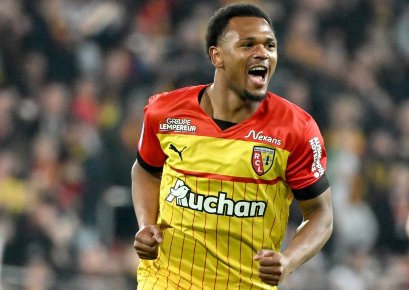 Lens' Belgian forward Lois Openda celebrates scoring his team's first goal during the French L1 football match between RC Lens and AS Monaco at Sta...