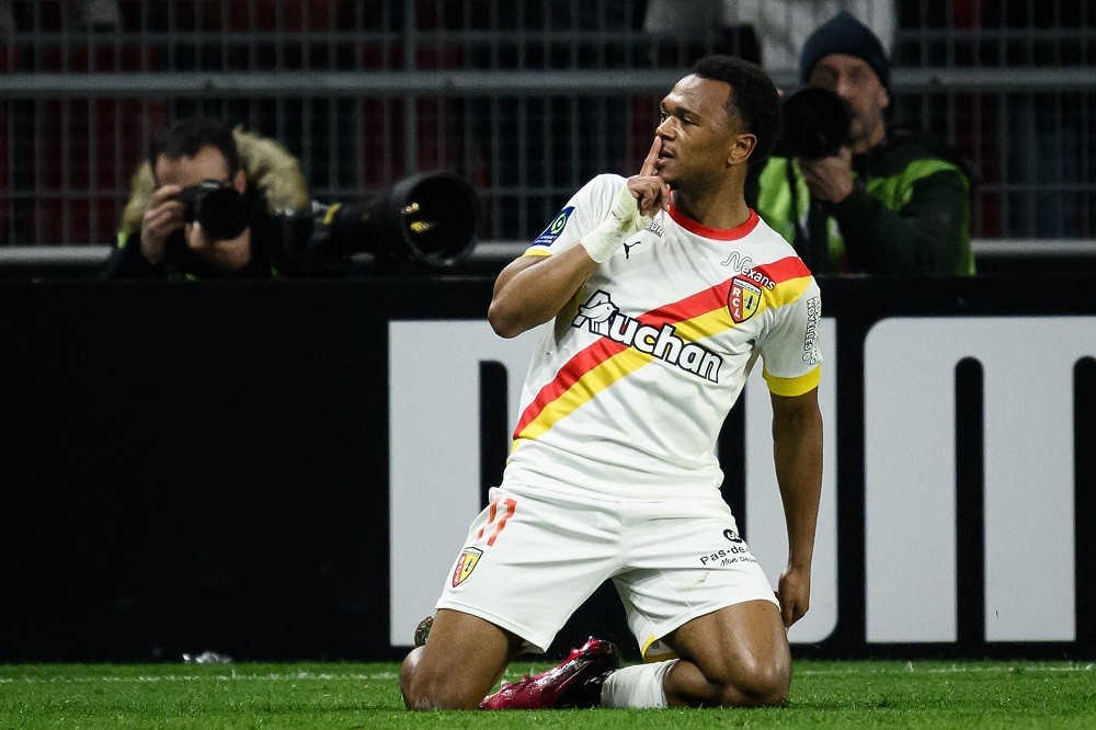 Lens' Belgian forward Lois Openda celebrates after scoring during the French L1 football match between Stade Rennais and RC Lens at the Roazhon Par...