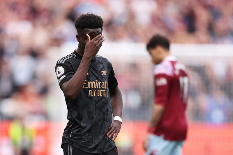 LONDON, ENGLAND - APRIL 16: Bukayo Saka of Arsenal looks dejected during the Premier League match between West Ham United and Arsenal FC at London ...