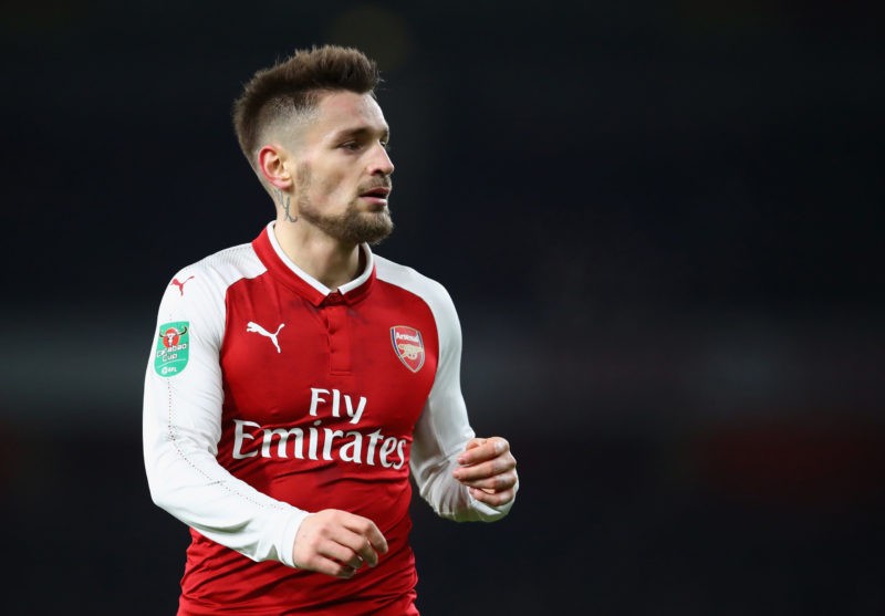 LONDON, ENGLAND - DECEMBER 19: Mathieu Debuchy of Arsenal looks on during the Carabao Cup Quarter Finals match between Arsenal and West Ham United ...