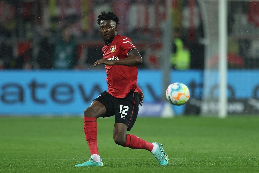 Arsenal transfers - LEVERKUSEN, GERMANY: Edmond Tapsoba of Leverkusen runs with the ball during the Bundesliga match between Bayer 04 Leverkusen an...