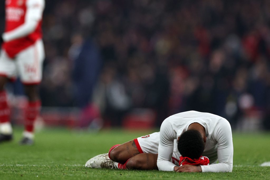 Arsenal loanee suffers hamstring injury in 5th start 4 Arsenal's English midfielder Reiss Nelson reacts on the pitch after the English Premier League football match between Arsenal and Southampton at the Emirates Stadium in London on April 21, 2023. - The game finished 3-3. (Photo by ADRIAN DENNIS/AFP via Getty Images)