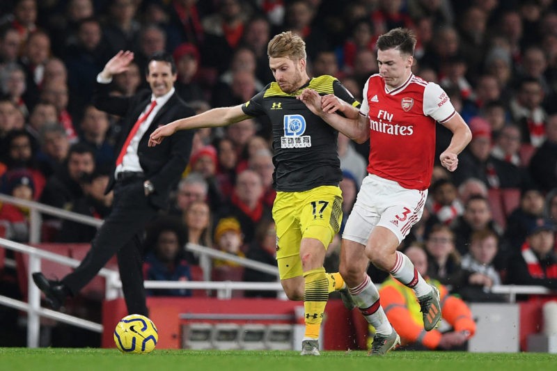 Arsenal's Spanish head coach Unai Emery (L) gestures on the touchline as Southampton's Scottish midfielder Stuart Armstrong (C) vies with Arsenal's Scottish defender Kieran Tierney (R) during the English Premier League football match between Arsenal and Southampton at the Emirates Stadium in London on November 23, 2019. (Photo by DANIEL LEAL/AFP via Getty Images)