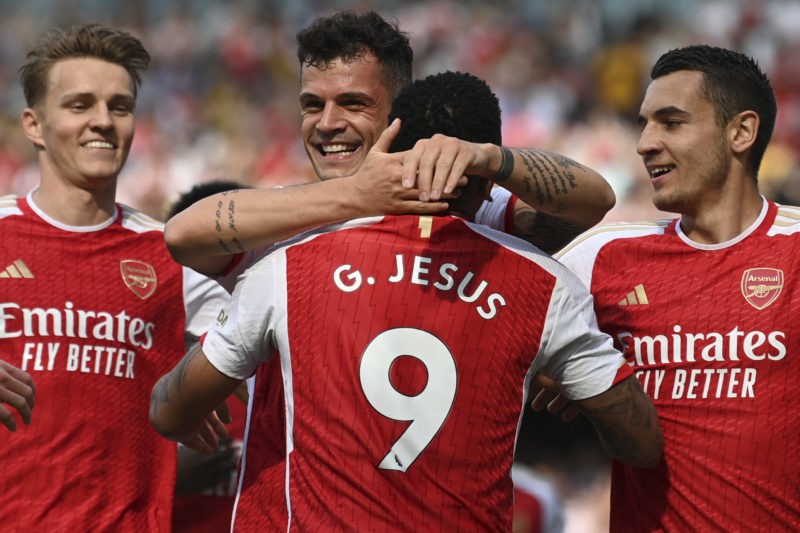 Bayern Munich make offer for Granit Xhaka 6 Arsenal news and gossip - Arsenal's Swiss midfielder Granit Xhaka (back C) celebrates with teammates after scoring his team's first goal during the English Premier League football match between Arsenal and Wolverhampton Wanderers at the Emirates Stadium in London on May 28, 2023. (Photo by GLYN KIRK/AFP via Getty Images)