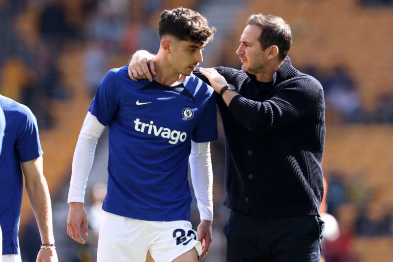 Chelsea's English caretaker manager Frank Lampard (R) speaks with Chelsea's German midfielder Kai Havertz (L) during warm-up ahead of the English P...
