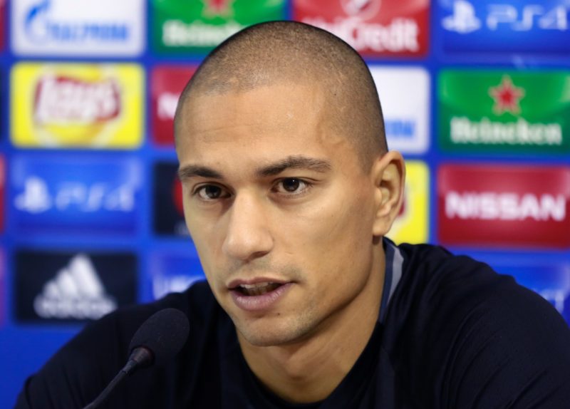 Besiktas' Swiss midfielder Gokhan Inler speaks during a press conference at the San Paolo Stadium in Naples on October 18 2016, on the eve of the U...