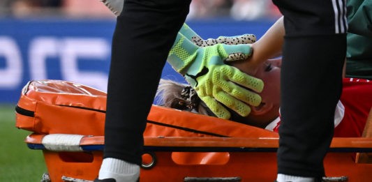 Arsenal's Austria defender Laura Wienroither is evacuated on a stretcher during the UEFA Women's Champions League semi-final second-leg match between Arsenal and Wolfsburg at the Arsenal Stadium, in London, on May 1, 2023. (Photo by Ben Stansall / AFP) (Photo by BEN STANSALL/AFP via Getty Images)
