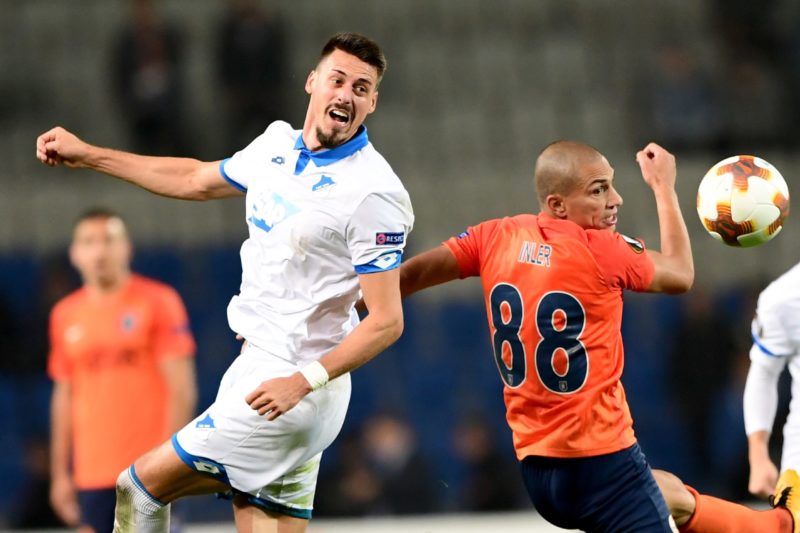 Hoffenheim's German forward Sandro Wagner (L) vies with Basaksehir's Swiss midfielder Gokhan Inler reacts during the UEFA Europa League (C3) football match Istanbul Basaksehir versus 1899 Hoffenheim at the Fatih Terim Stadium on November 2, 2017 in Istanbul. (Photo credit OZAN KOSE/AFP via Getty Images)