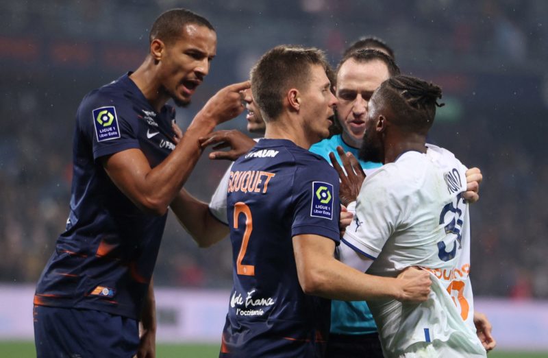 Montpellier's French defender Christopher Jullien (L) and Marseille's Portuguese defender Nuno Tavares (R) argue during the French L1 football match between Montpellier Herault SC and Olympique Marseille (OM) at Stade de la Mosson in Montpellier, southern France on January 2, 2023.  (Photo by PASCAL GUYOT/AFP via Getty Images)