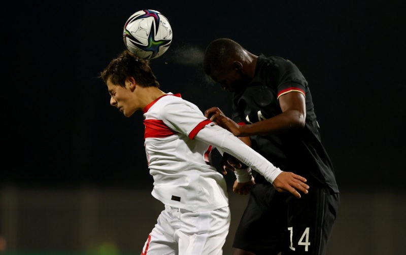 HANOVER, GERMANY - NOVEMBER 12: Noel Bigo Atom (R) of Germany challenges Arda Güler of Turkey during the International Friendly between Germany U17...