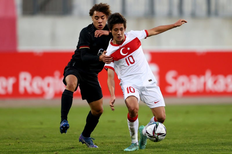 HANOVER, GERMANY - NOVEMBER 12: Rafael Lubach (L) of Germany challenges Arda Güler of Turkey during the International Friendly between Germany U17 and Turkey U17 at Eilenriedestadion on November 12, 2021 in Hanover, Germany. (Photo by Martin Rose/Getty Images for DFB)