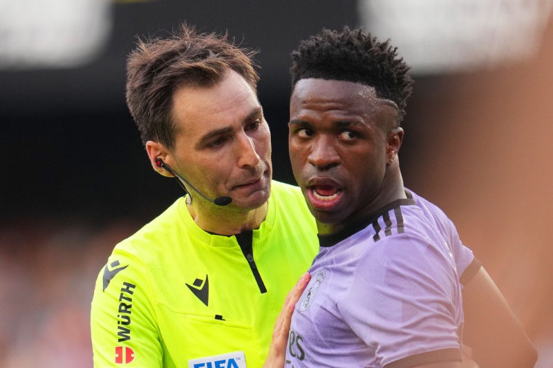 VALENCIA, SPAIN - MAY 21: Referee Ricardo de Burgos Bengoetxea speaks with Vinicius Junior of Real Madrid during the LaLiga Santander match between...