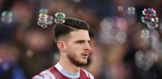 Declan Rice Arsenal transfers LONDON, ENGLAND - APRIL 26: Declan Rice of West Ham United looks on as they walk out of the tunnel prior to the Premier League match between West Ham United and Liverpool FC at London Stadium on April 26, 2023 in London, England. (Photo by Julian Finney/Getty Images)