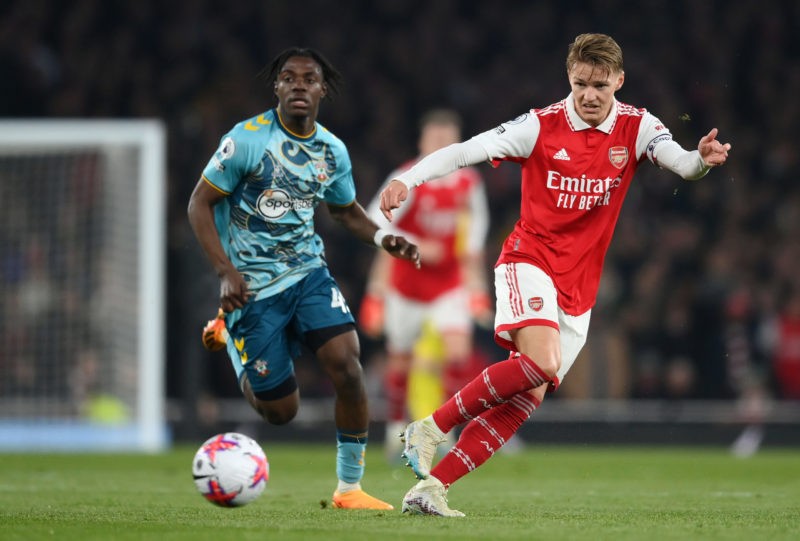 Arsenal now in advanced talks to sign €32m 19yo 3 LONDON, ENGLAND - APRIL 21: Martin Odegaard of Arsenal passes the ball under pressure from Romeo Lavia of Southampton during the Premier League match between Arsenal FC and Southampton FC at Emirates Stadium on April 21, 2023 in London, England. (Photo by Shaun Botterill/Getty Images)