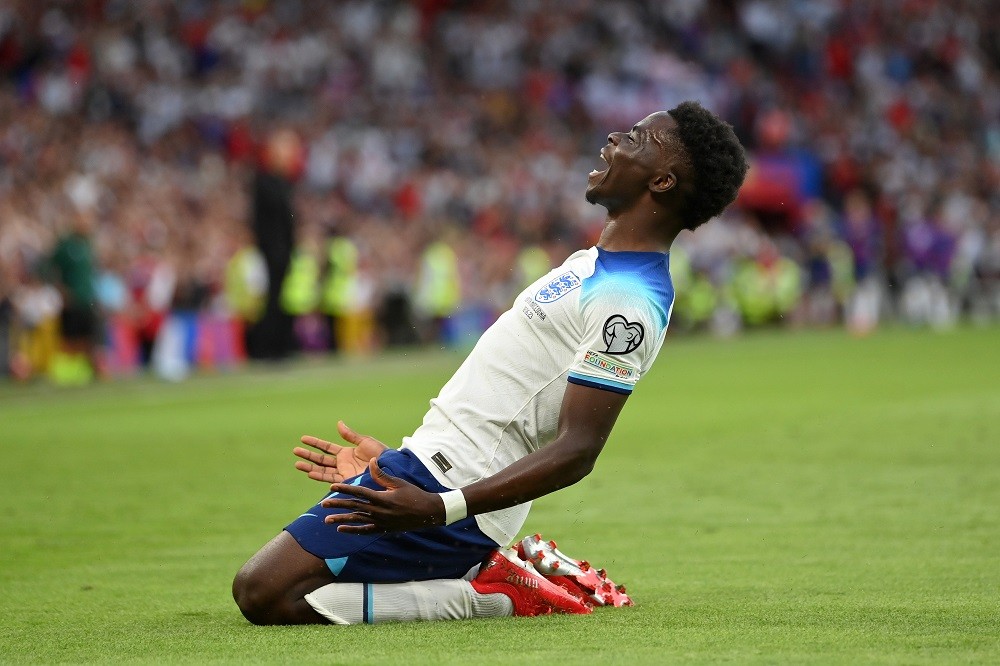 MANCHESTER, ENGLAND: Bukayo Saka of England celebrates after scoring the team's fifth goal and his third during the UEFA EURO 2024 qualifying round...