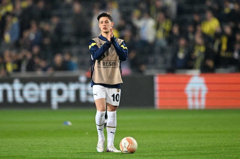 Fenerbahce's Turkish midfielder Arda Guler warms up ahead of the UEFA Europa League last 16 second leg football match between Fenerbahce SK and Sev...