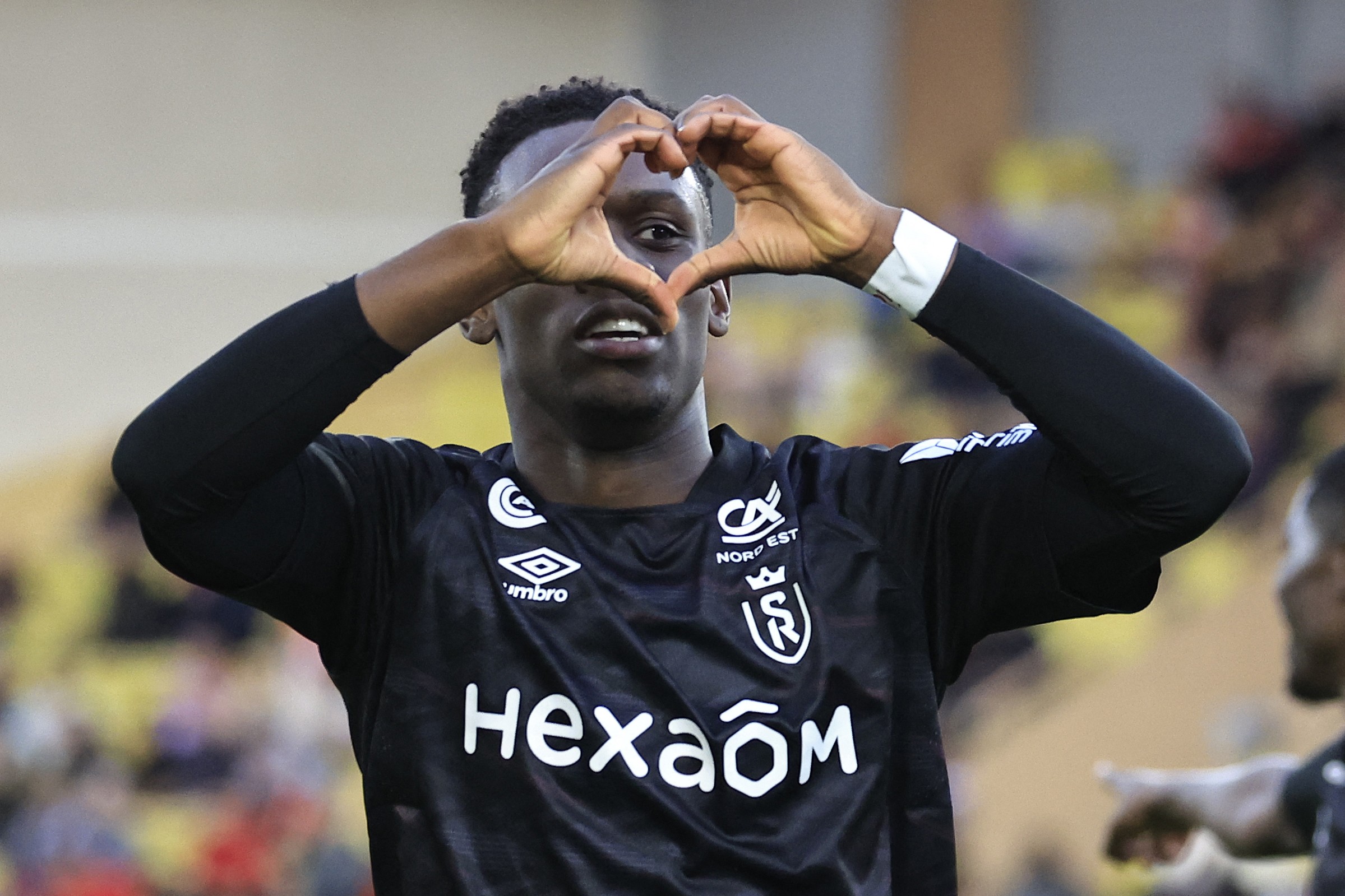 Folarin Balogun Arsenal exit -Reims' English forward Folarin Balogun celebrates after scoring a goal during the French L1 football match between AS...