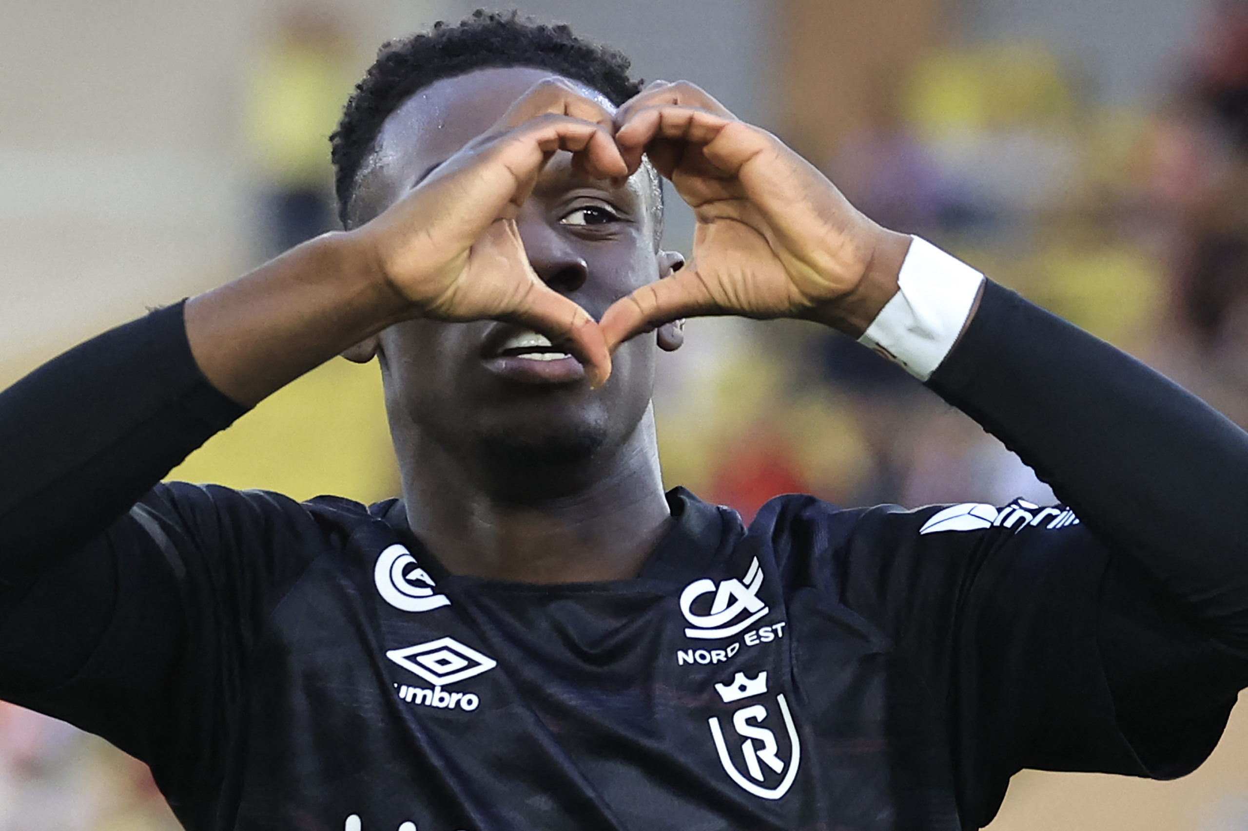 Folarin Balogun Arsenal exit -Reims' English forward Folarin Balogun celebrates after scoring a goal during the French L1 football match between AS...
