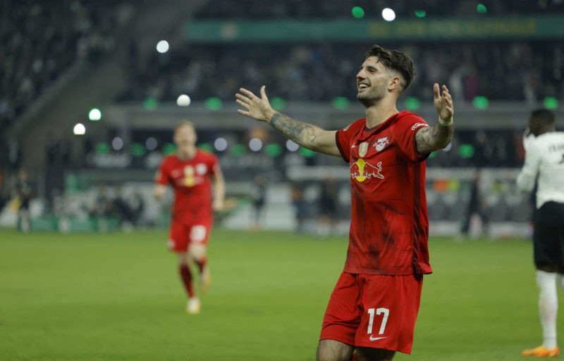 Are Arsenal making Szoboszlai move again? 5 Leipzig's Hungarian midfielder Dominik Szoboszlai celebrates after scoring the 2-0 goal during the German Cup (DFB Pokal) final football match RB Leipzig v Eintracht Frankfurt in Berlin, Germany, on June 3, 2023. (Photo by ODD ANDERSEN/AFP via Getty Images)