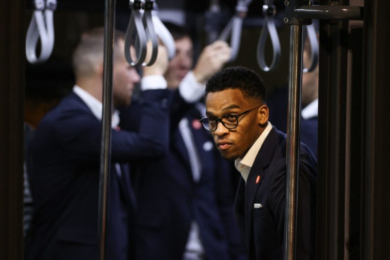 Netherlands' defender Jurrien Timber looks out from the bus after the team's arrival at the Hamad International Airport in Doha on November 15, 202...